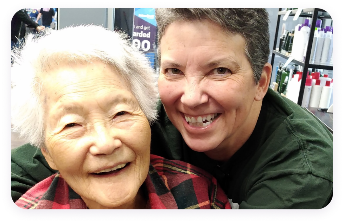 Lynn Kerr hugging elderly mother