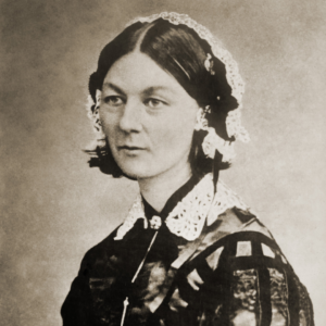 A black and white image of Florence Nightingale, a pioneer of women in home health care.